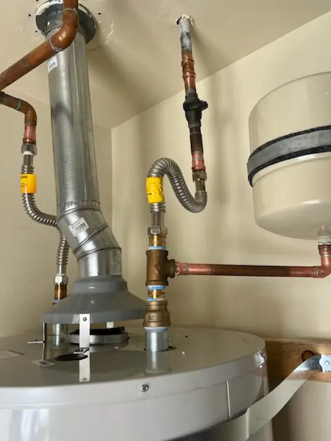 Water heater installation and plumbing repair in Roan